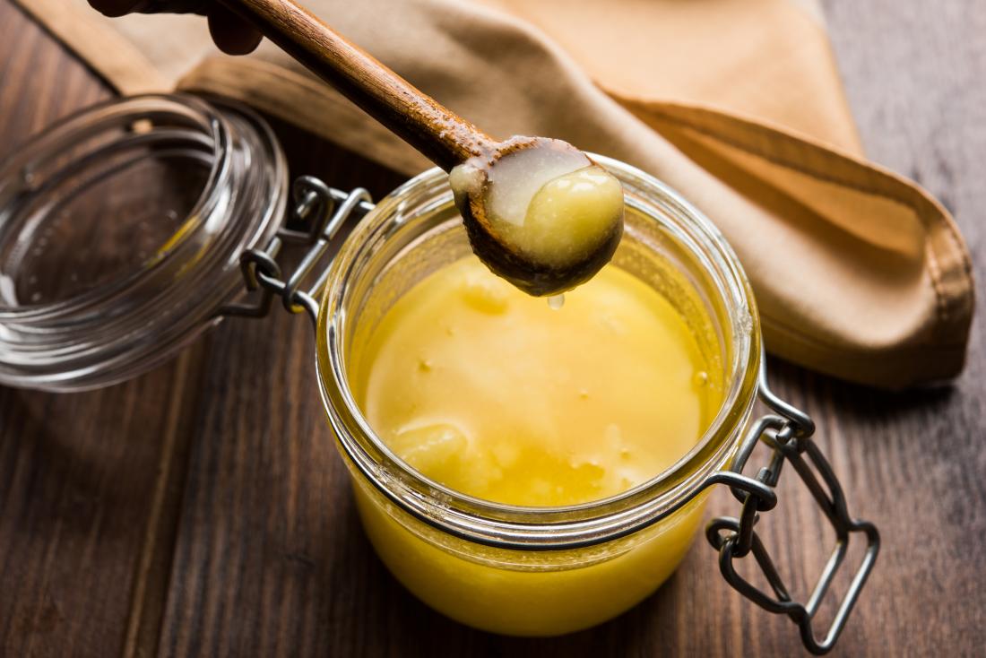 ghee-butter-in-glass-jar-with-wooden-spoon.jpg